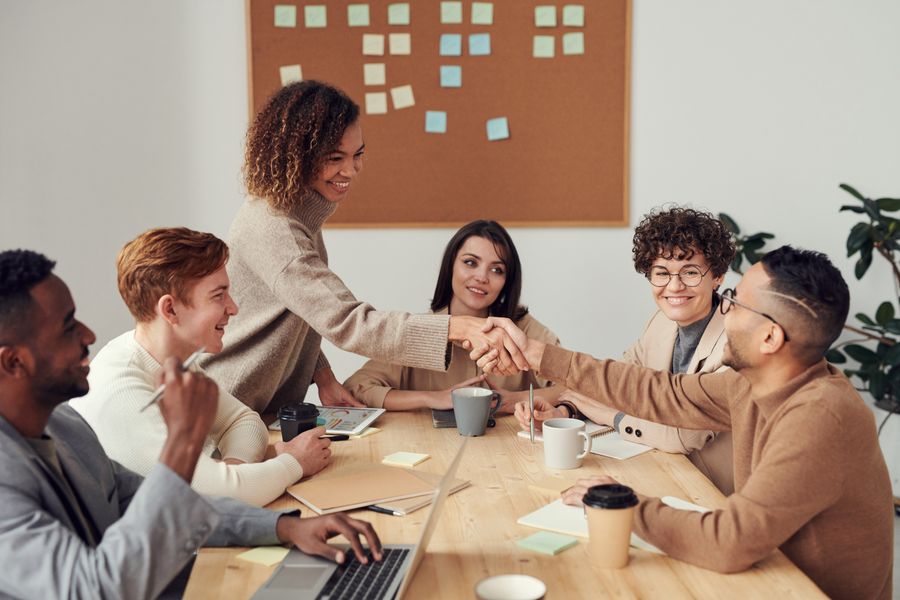 IT outsourcing team collaborating in a meeting